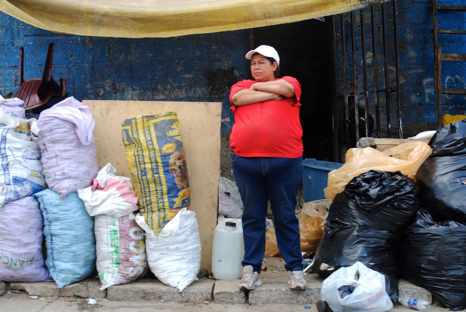 scavenger standing streetside guatemala